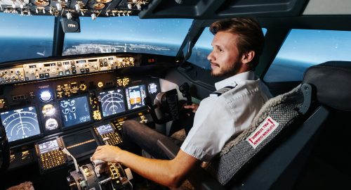 First officer is controlling autopilot and parameters for safety flight. Cockpit of Boeing aircraft. Content is good any airline.